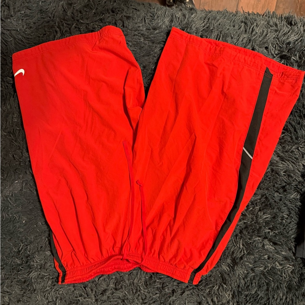 Nike Red Athletic shorts with Black Stripe